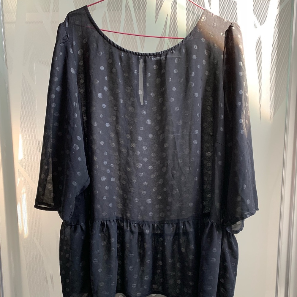 Sheer peplum high-low top